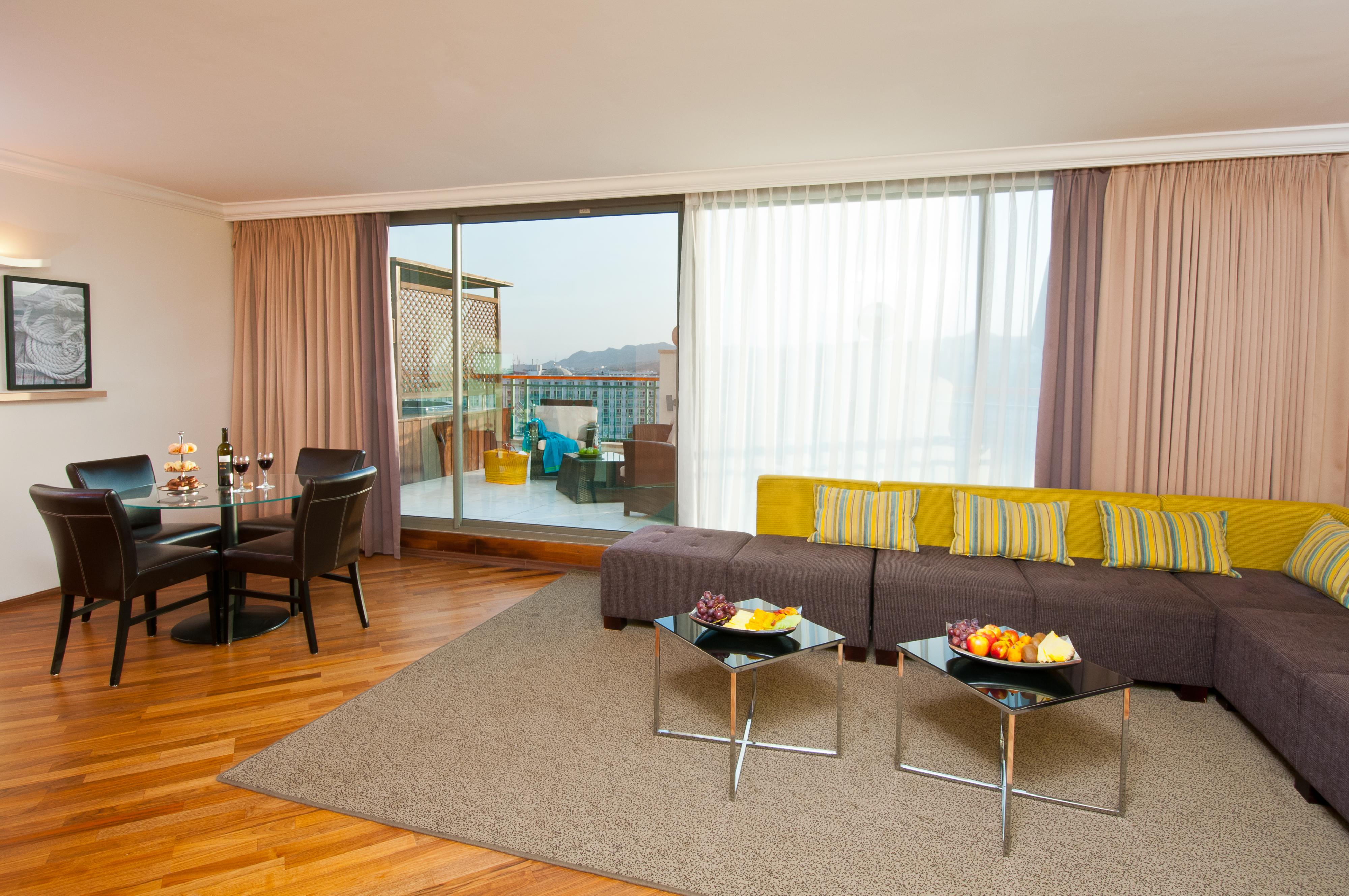 U Magic Palace Eilat Ngoại thất bức ảnh A living room at the hotel